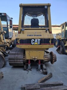 Tracked equipment supported with blocking under chassis