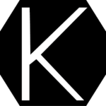 Black Class K fire symbol showing a white letter “K” inside a black octagon above an icon of a pan with flames, indicating fires involving cooking oils and fats typically found in commercial kitchens.